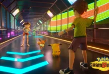 Two young trainers stand with Pikachu and Eevee in a brightly lit, futuristic hallway from Pokémon Champions.