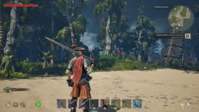 A video game character with a large sword and red cape stands on a sandy beach facing a dense coastal jungle.