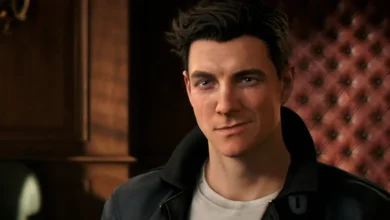 Close-up portrait of Harry Osborn from Marvel's Spider-Man 2 smirking while wearing a dark leather jacket against a background of wood paneling and red tufted upholstery.