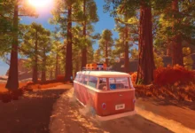 A red camper van drives along a sun-drenched dirt road through a forest of towering trees.
