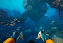 First-person perspective of a scuba diver exploring a vibrant coral reef using futuristic propulsion devices.