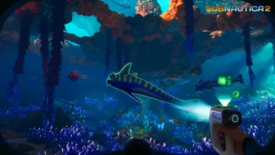 First-person gameplay from Subnautica 2 showing a scanner tool being used on a striped alien fish in a vibrant bioluminescent underwater environment.