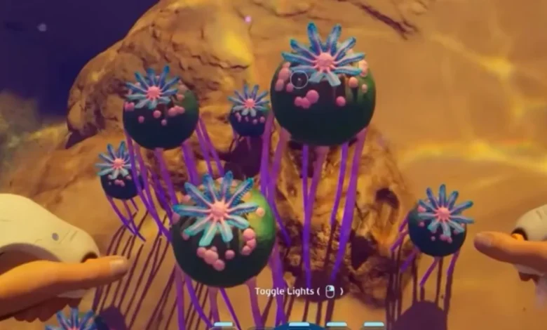 A first-person view of spherical, dark green alien plants with pink star-shaped flowers and long purple stalks in an underwater video game.