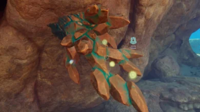 A cluster of amber-colored crystals with glowing teal veins grows from a rocky underwater cave wall in a video game.