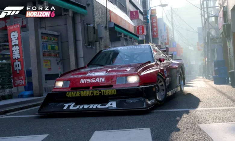 A red Nissan Skyline race car parked on a narrow, sunny Japanese city street with the Forza Horizon 6 logo in the corner.