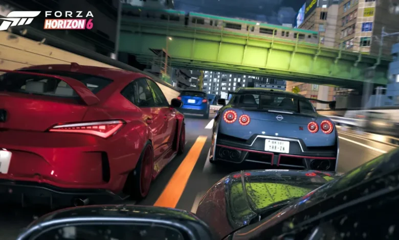 A red and a blue sports car speed through a neon-lit urban city at night under a green bridge in a scene from Forza Horizon 6.