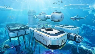 A futuristic, modular underwater research base situated beneath a frozen ocean surface, surrounded by marine life and a large shark.