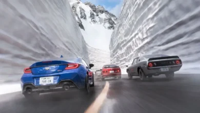Several sports cars speed along a mountain road between towering walls of snow.