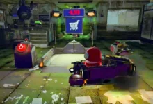 A red crewmate-like character sits in a purple vehicle within a cluttered industrial setting, facing a digital display showing a negative balance and a shopping cart icon.