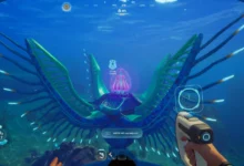 A first-person view from an underwater video game features a massive, vibrant blue and green alien creature with wing-like fins and a glowing pink core.