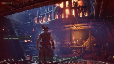 A pirate stands on the lower deck of a burning wooden ship, looking toward a staircase as fire engulfs the structure above.