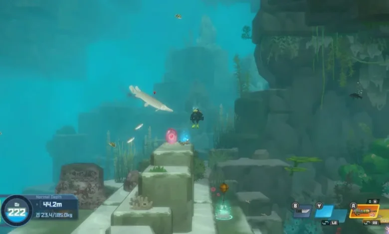 A scuba diver explores a vibrant underwater environment with ancient stone ruins and a large fish in a stylized video game.