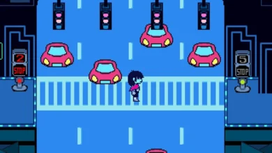Kris from Deltarune stands in the middle of a pixelated blue crosswalk amidst small pink cars and traffic lights.