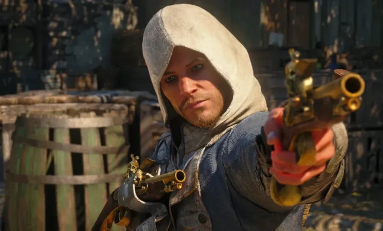 A man in a white assassin's hood aims a golden flintlock pistol directly at the viewer in a sunlit, rustic outdoor setting.