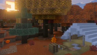 A sunset glows over a blocky Minecraft campsite nestled within an autumn forest of orange and yellow trees.