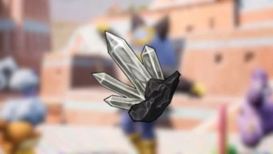 A cluster of pointed, translucent gray crystals growing from a dark rock base against a blurred anime-style background.